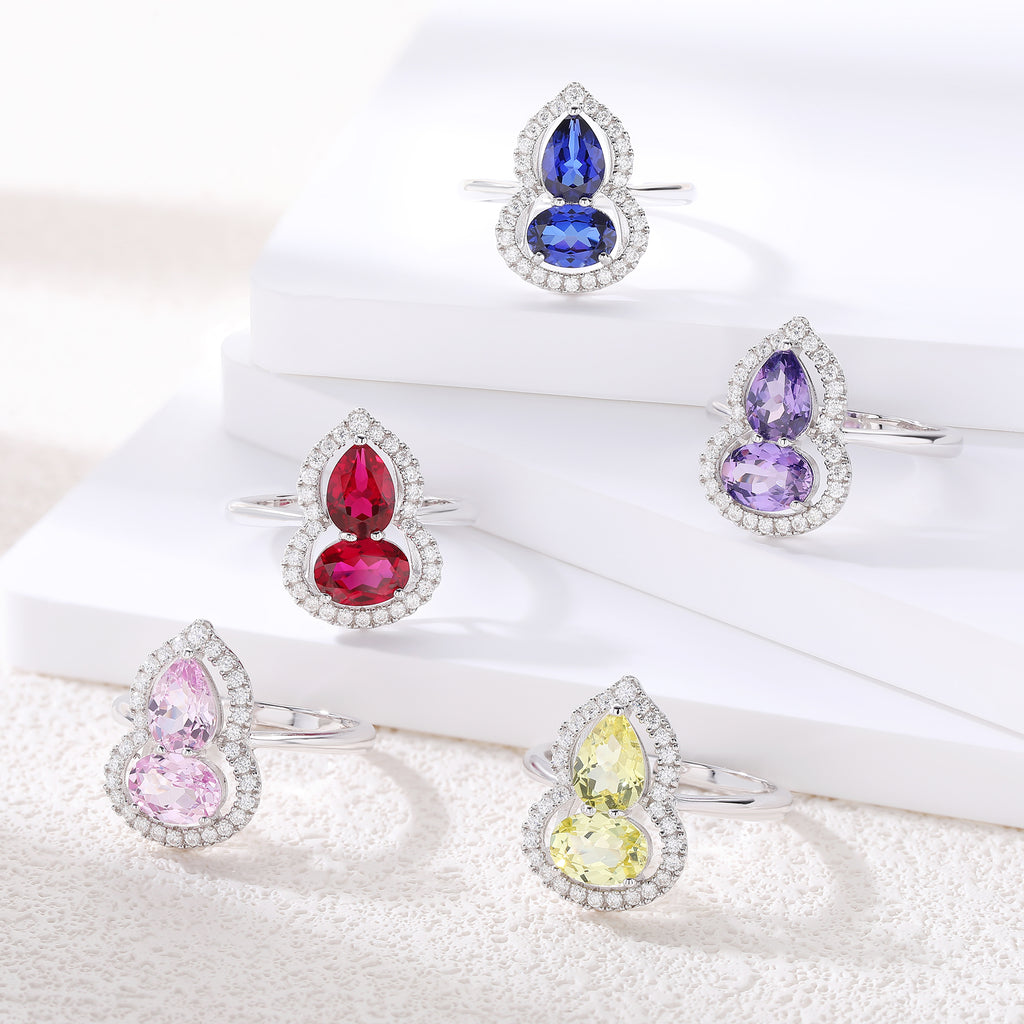 Bague sertie de pierres en forme de gourde avec halo complet