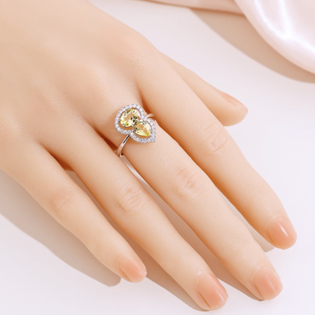 Bague sertie de pierres en forme de gourde avec halo complet
